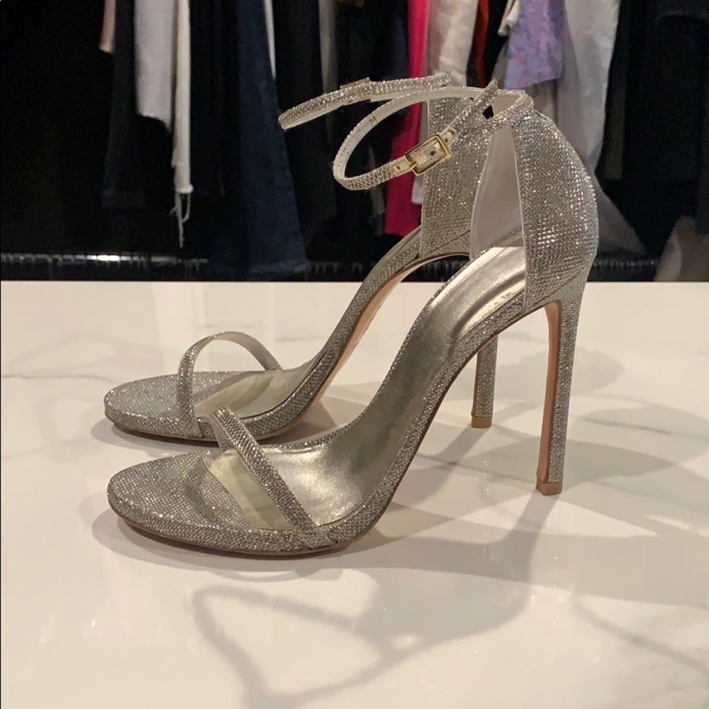 Stuart Weitzman “Nudist” in Platinum Lamé